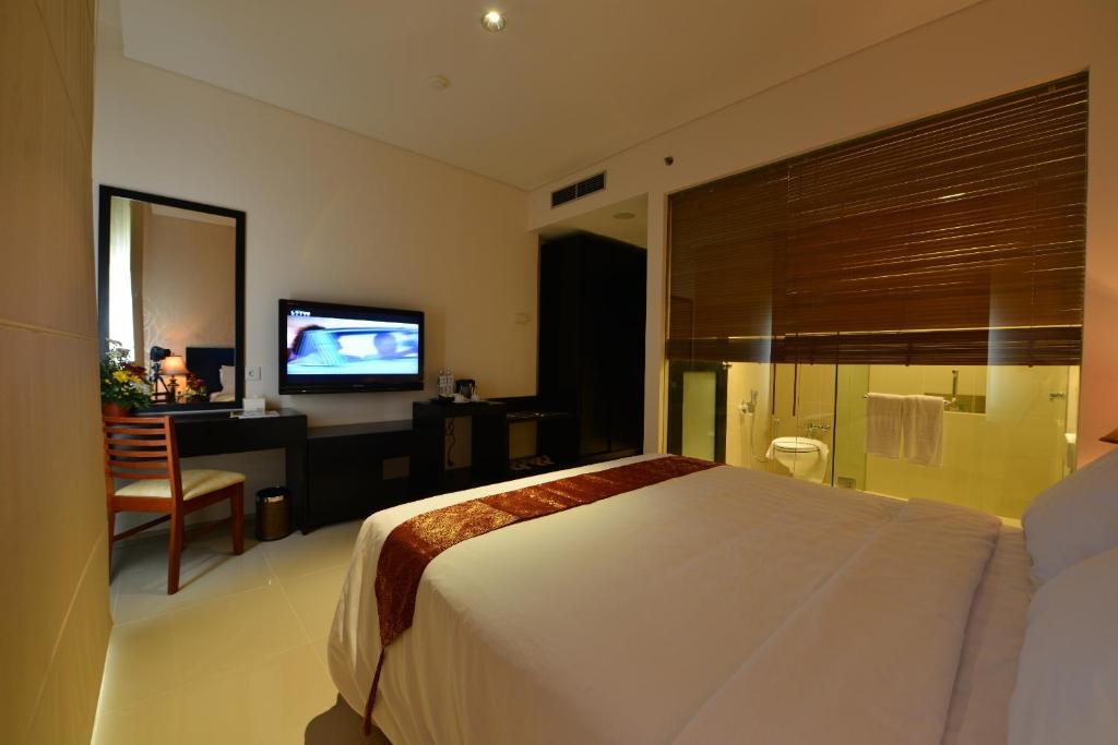 Emilia Hotel By Amazing - Palembang Phòng bức ảnh